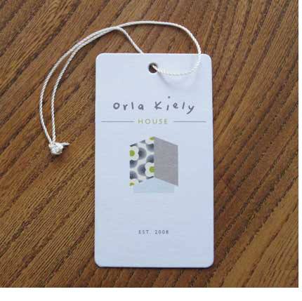 Photograph of a paper Orla Kiely shop tag